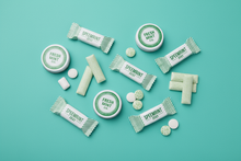 Load image into Gallery viewer, spearmint gum and mints on a teal background
